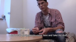 A attractive lad takes his clothes off